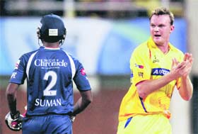 Doug Bollinger celebrates the wicket of T Suman in Mumbai