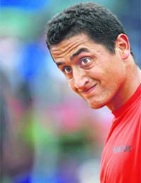 Nicolas Almagro reacts during his match against Jo-Wilfried Tsonga during the Barcelona Open tournament