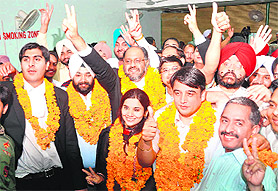 Gurinder Singh Attariwala (center) with office-bearers after winning the Punjab and Haryana Bar Council election in Chandigarh on Friday.