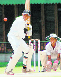 A batsman plays a shot during the semifinal match for Markan Trophy (U-16) at the PCA Stadium, Mohali, on Friday.