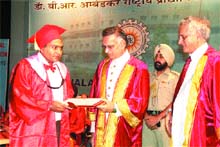 Punjab Governor Shivraj Patil confers degree on a student at a convocation of Dr BR Ambedkar National Institute of Technology in Jalandhar on Friday. 