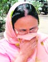 Rachhpal Kaur, who has been accused of selling habit-forming drugs from a chemist shop at Raikot, in police custody.