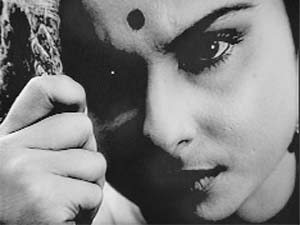 Charu in Charulata is starved of company in her lonely world