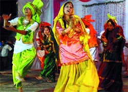 Students of KV No 1 (left) presenting a cultural item during annual day function at Bathinda Cantonment late on Friday evening