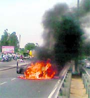 Two cars caught fire near Lalru on Saturday. An Indigo car bearing Delhi number caught fire near toll plaza, Dappar, while an Indica car suddenly caught fire and rammed into a four-wheeler. Nobody was hurt in the fire. Fire tenders were pressed into service for dousing the flames.