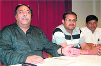 Harish Virmani, Dehradun City Congress president, addresses a press conference in Dehradun