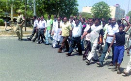 Members of various organisations hold a protest march against atrocities on Dalits in Haryana, in Phagwara on Saturday. Photo: Ashok Kaura 