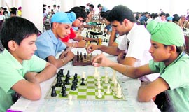 Players take part in the Punjab State Chess Championship in Ludhiana on Saturday. A Tribune photograph