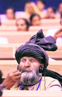 A delegate at the conference to celebrate the National Panchayati Raj Day in New Delhi on Saturday. 