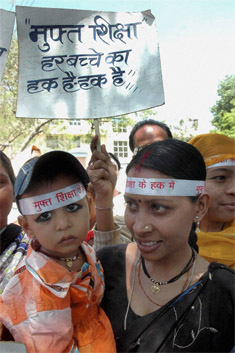 People take part in the mock funeral procession of the Union Government organised by an NGO demanding right of free education to every child, on the last day of World Education Week, in Bhopal on Saturday.