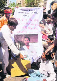 Cricket fans during a protest against IPL chief Lalit Modi in Ahmedabad on Saturday.