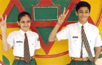 Mallika Chaudhary and Shrenik Borad showing victory sign over selection for Japan tour in Sriganganagar