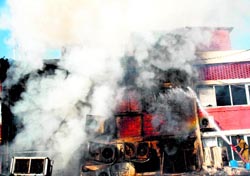 Smoke billows from a restaurant in Sector 26, Chandigarh, on Sunday.