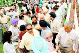 Members of the Chandigarh Golf Club during the election of the governing councils team on Sunday. Tribune photo: Parvesh Chauhan
