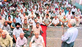 Members of the J&K Pensioners Association participate in a rally at Geeta Bhawan in Jammu on Sunday. A Tribune photograph