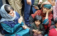 PDP president Mehbooba Mufti on Sunday consoles family members of Ghulam Mohammad Kalas who was killed by Army personnel during a search operation in Keller forest in Shopian. Tribune photo: Amin War
