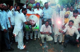 Congress supporters burst crackers following the Supreme Courts judgment in Captain Amarinder Singhs favour, in Bathinda, on Monday. Tribune photo: Pawan Sharma