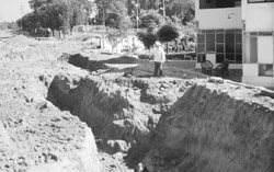 Digging work to lay down the sewer in progress near the house of Dr Sher Singh, 