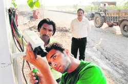 A CCTV camera being installed at the regulator end of the Sukhna Lake in Chandigarh