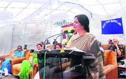 Sabinder Lamba, regional president of the Army Welfare Association, addressing a gathering at the Veer Nari Sammelan at the Army Command in Shimla on Monday. 