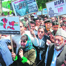 PDP President Mehbooba Mufti leads a march, demanding the resolution of the Kashmir issue, at Lal Chowk in Srinagar on Monday.