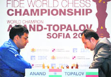 Indian Viswanathan Anand plays against Veselin Topalov during their second game of the FIDE World Chess Championship at Sofias Military Club on Sunday.