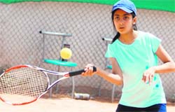 A player in action during the Manav Mangal Total Tennis AITA Talent Series Championship at the Total Tennis Academy, Manav Mangal Smart School, Phase 10, Mohali, on Tuesday.