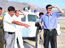 Chief Mela Officer Anand Vardhan and ADM Mela AS Dhanik inspect the Bairagi mela camp area in Haridwar on Tuesday. Tribune photo: Rameshwar Gaur