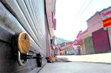 Locked shutters of shops at Shimla in view of the nationwide bandh called by Left parties against price rise on Tuesday. Tribune photo: Amit Kanwar