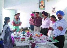 A student gives a demonstration of her model at the science mela at Government Senior Secondary School in Nawanshahr on Tuesday.
