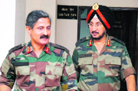Outgoing Major-Gen K Surindernath, GOC, Tiger Division (left) along with incumbent Major-Gen TPS Waraich during a function at the Defence Accounts Department in Jammu