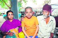 Lali in the company of his parents at Nehru Market police post in Jammu 