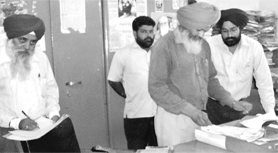 Members of the district language committee check records of the forest department in Ropar on Wednesday.