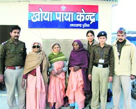 Personnel of the Lost and Found cell with some persons who got separated from their loved ones