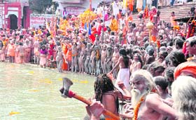Naga sadhus offer prayers during the last Shahi Snan in Haridwar