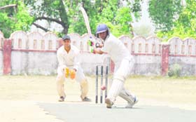 A batsman plays a shot at the Central Government Employees Welfare Coordination Committee Cricket Tournament in Dehradun