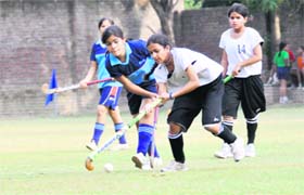 A match in progress at the Inter-council School Junior Girls Hockey Tournament in Dehradun