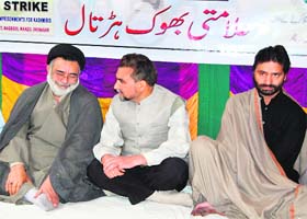 Jammu and Kashmir Liberation Front chairman Yasin Malik (extreme right) observes a fast in Srinagar on Wednesday in protest against the court verdict in the Lajpat Nagar blast case