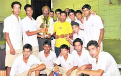 The Welham Boys A team with the trophy of the Golden Jubilee Basketball Tournament in Dehradun on Thursday.