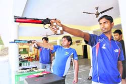 Shooters at the trials held near Dehradun on Thursday.