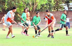A match in the Inter-council School Junior Girls Hockey Tournament in Dehradun on Thursday. 
