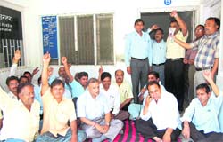 Former legislator of Haridwar Ambrish Kumar sits on a dharna with Gurukul University agitators to press for Central university status to Gurukul Kangri University in Haridwar on Thursday. 
