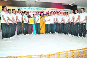 Hockey players of Shahabad being honoured by the Singla family in Kurukshetra