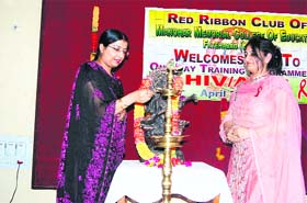 Dr Mamta Chaudhary (left) and Dr Anamika Bishnoi inaugurate a workshop on HIV/AIDS at Manohar Memorial College of Education in Fatehabad
