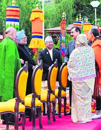 SAARC leaders (L/R) Hamid Karzai (Afghanistan), Mohamed Nasheed (Maldives), Manmohan Singh (India), Madhav Kumar Nepal (Nepal), Yousuf Raza Gilani (Pakistan), Sheikh Hasina (Bangladesh) and Jigme Yoser Thinley (Bhutan) in Thimphu on Thursday.