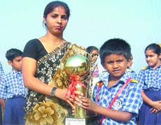 Virat Mehra of Eklavya School being honoured for winning the UC MAS Abacus and Mental Arithmetic Competition.