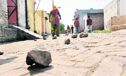 Bricks line the street following a land dispute at Tarf Kara Bara in Ludhiana