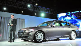BMW India president Peter Kronschnabl announces the launch of new BMW 5 Series cars in Mumbai on Friday. The cars are available in two petrol variants 535i and 523i and two diesel variants 530d and 525d. They are priced between Rs 38.90 lakh and Rs 45.90 lakh. 