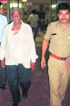 BJP leader Narinder Chaudary in police custody in Chandigarh on Friday.
