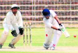 A batsman plays a shot during a match between Chandigarh and Ropar at the cricket stadium in Sector 16, Chandigarh, on Friday.